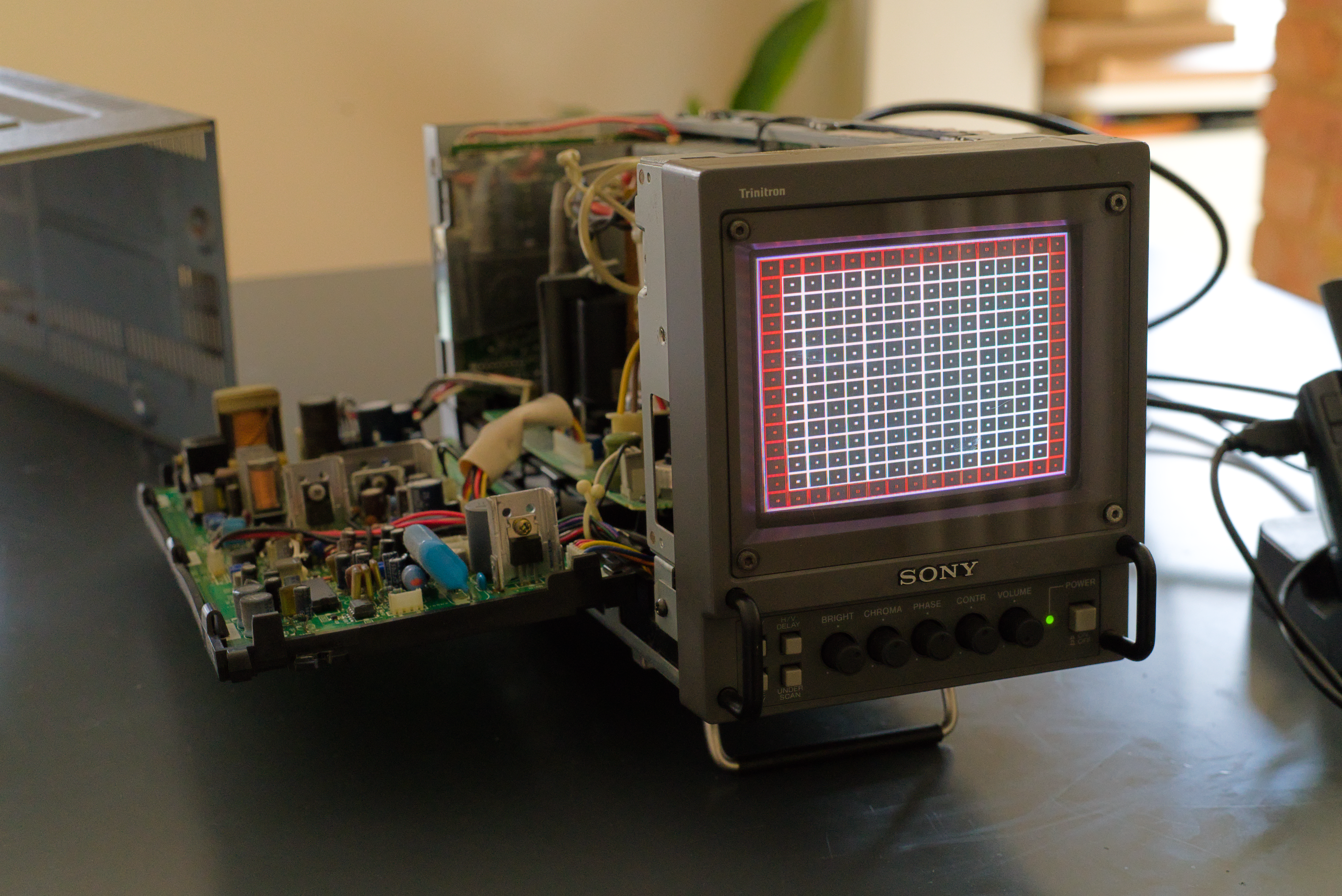 Case removed from Sony PVM-6041QM with left board (D-Board) lowered.