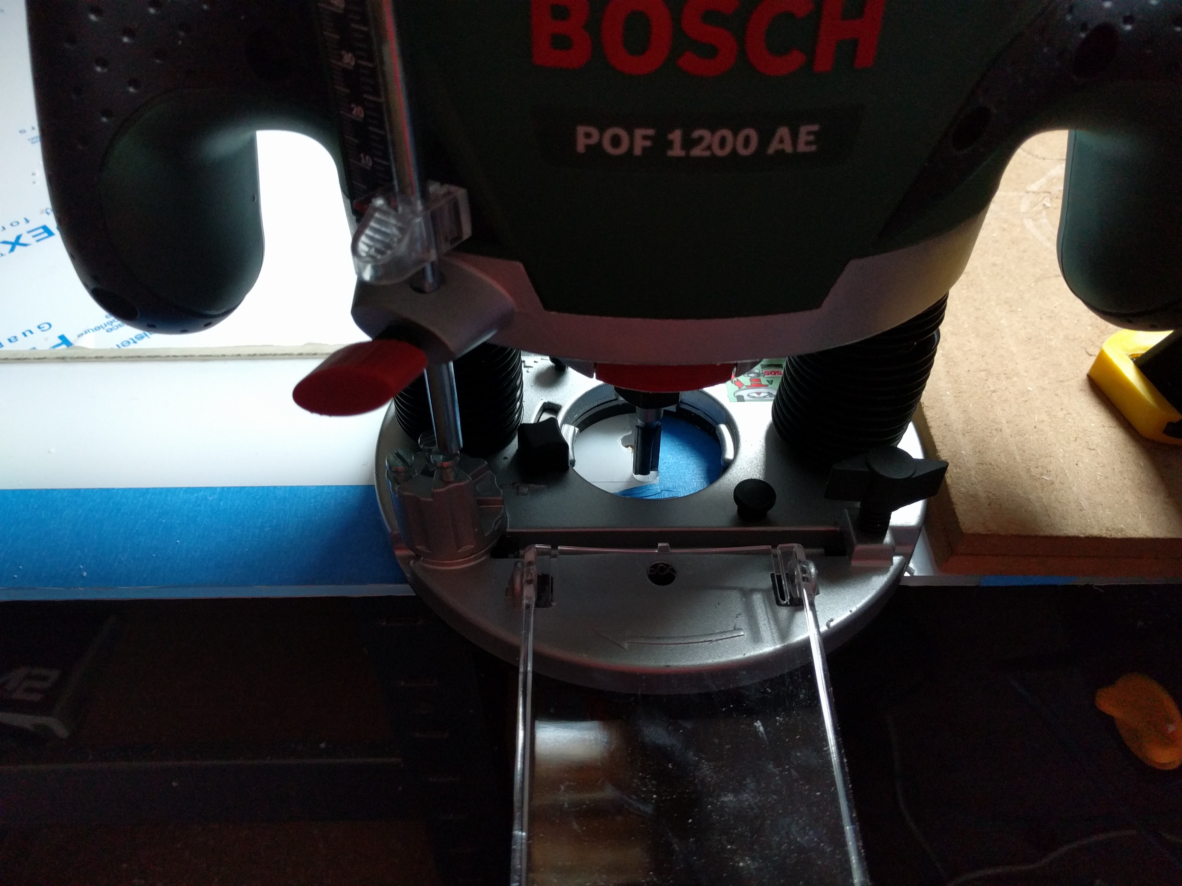 Hand routing the motherboard area.