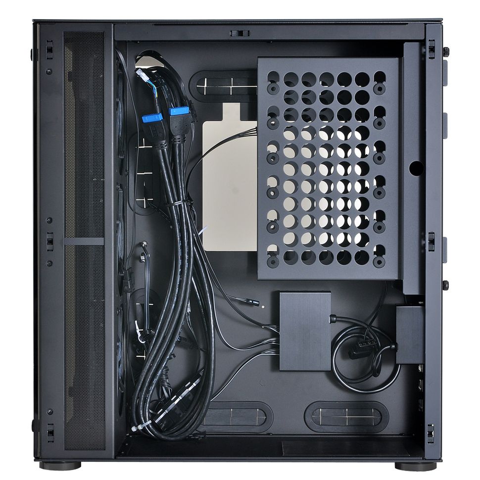 Read compartment of Lian Li PC-08 case. The PSU sits along the bottom of the compartment. Image Source: Toms Hardware